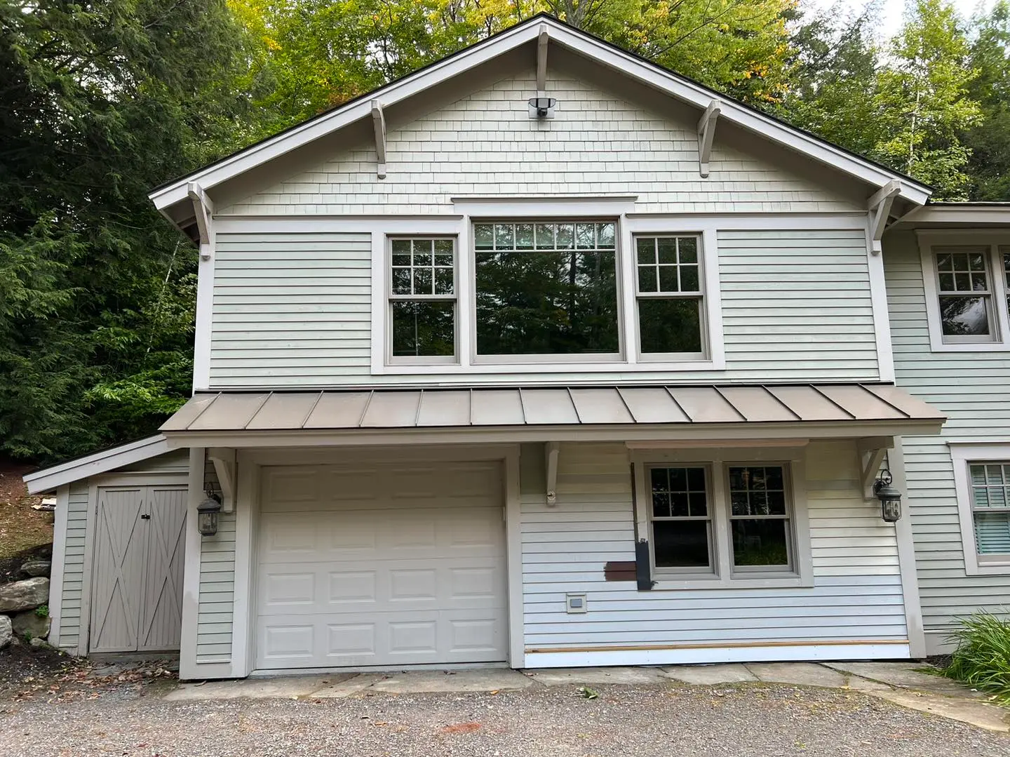 exterior siding and trim painting before image